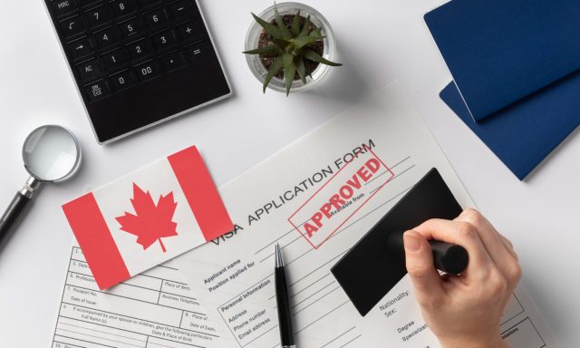 visa-application-composition-with-canadian-flag(1)